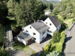 Schnäppchenjäger aufgepasst! Freistehendes Zweifamilienhaus im Herzen von Fischbach - Außenansicht II