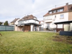 Rückansicht #01 - -VERKAUFT- Vielseitige Möglichkeiten! Mehrfamilienhaus in Saarbrücken mit Doppelgarage und Garten